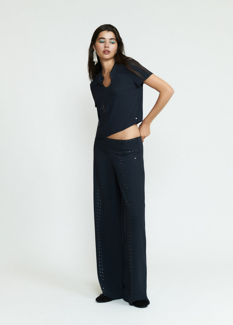 Pantalón largo tachas