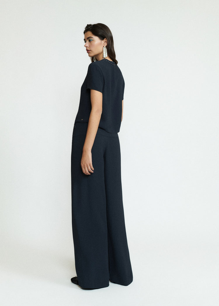Pantalón largo tachas
