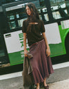 Lange geruite rok met asymmetrische zoom