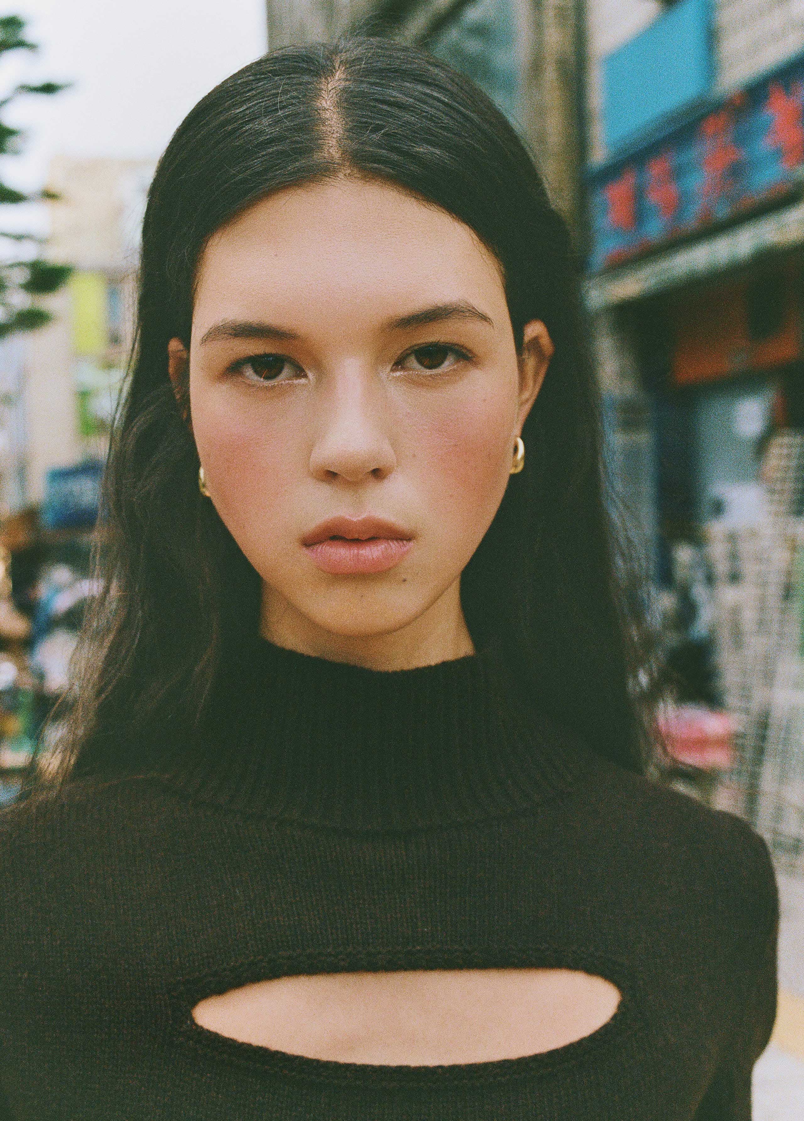 Short brown jumper with cut-out details