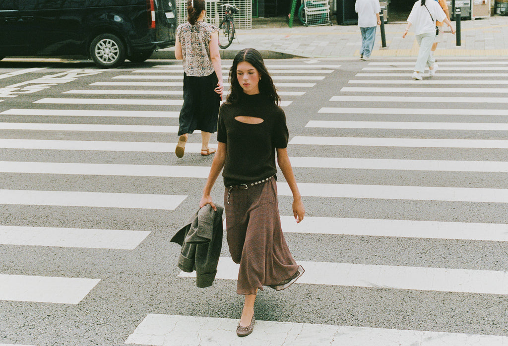 Lange geruite rok met asymmetrische zoom