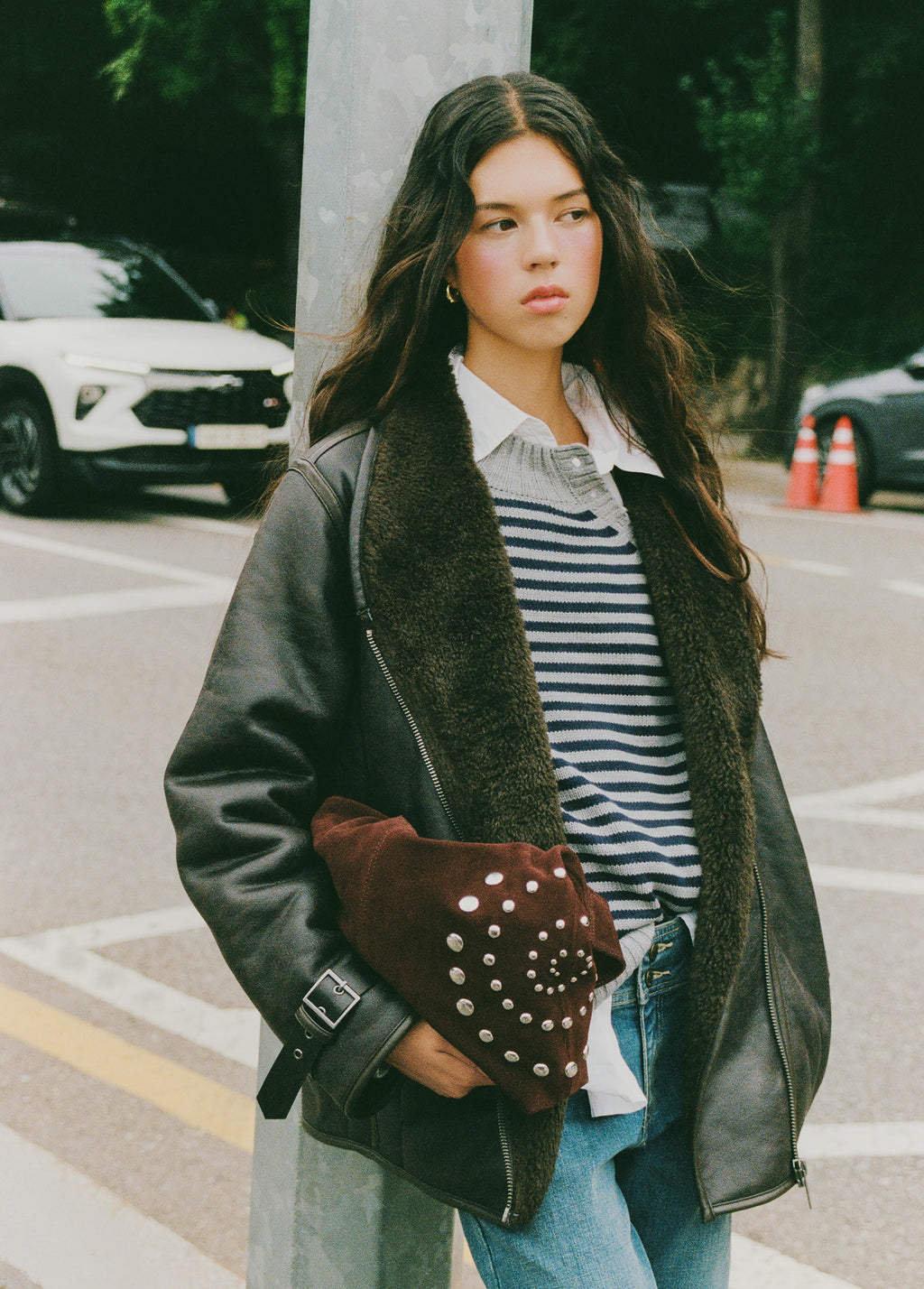Shoulder bag with spiral studs