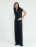 Pantalón largo tachas