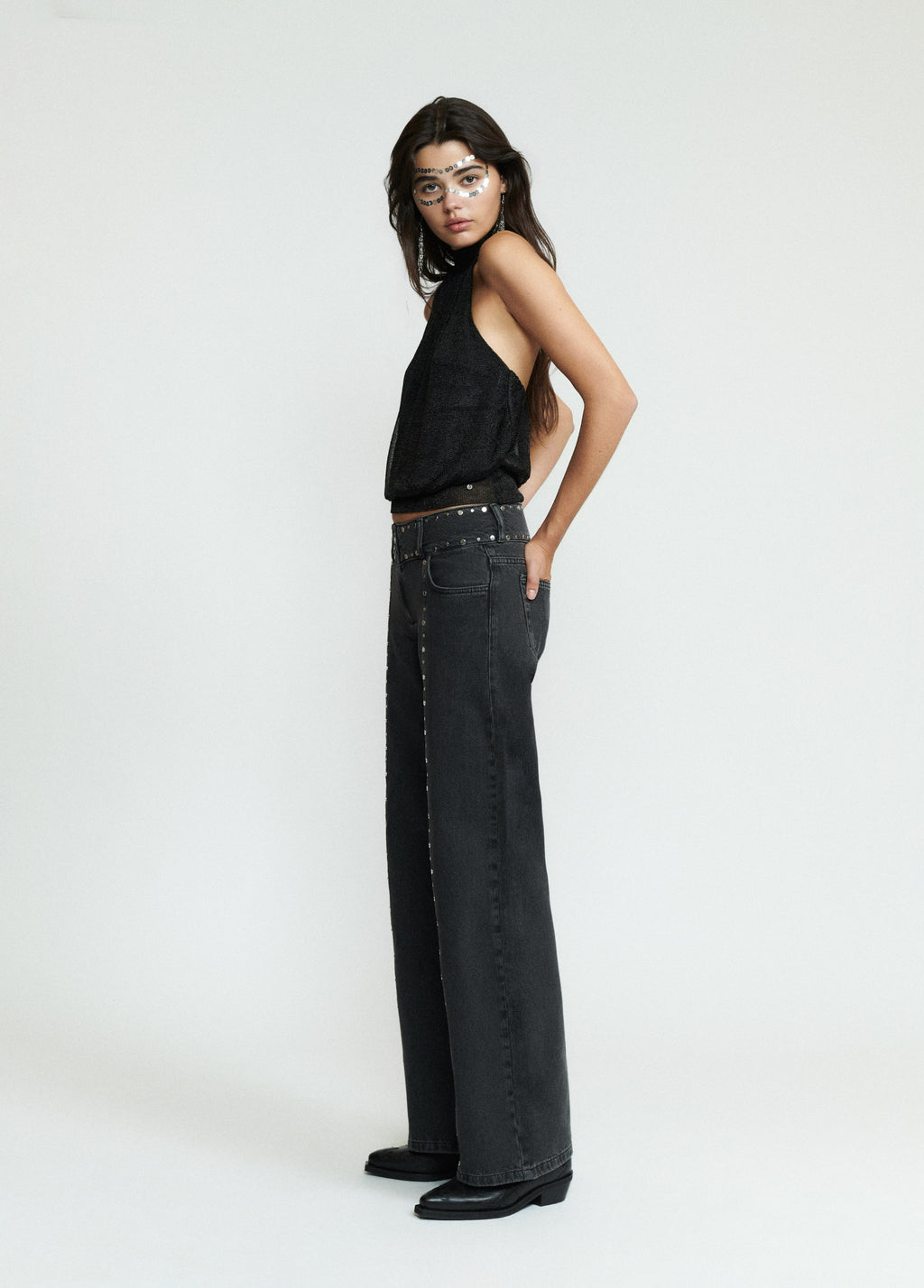 Studded denim pants with front zipper