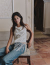 Top jacquard con flecos