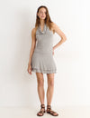 Rok met ceintuur en eyelets