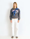 Low-rise pants with glitter stars and studs