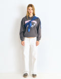 Low-rise pants with glitter stars and studs