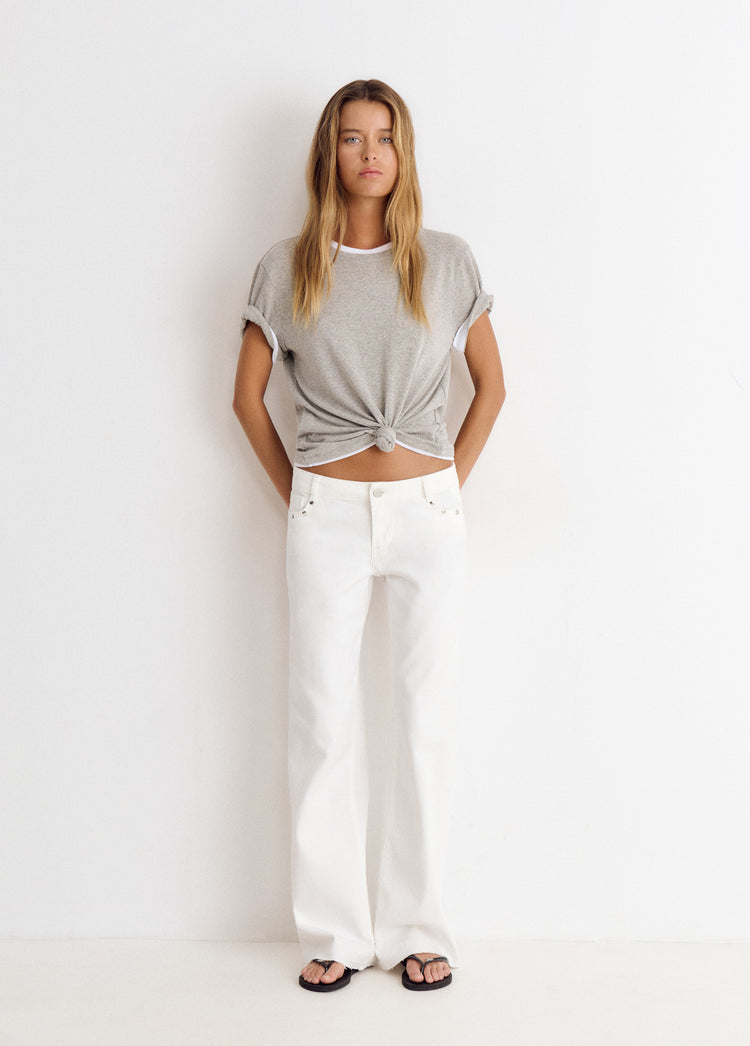 Low-rise pants with glitter stars and studs