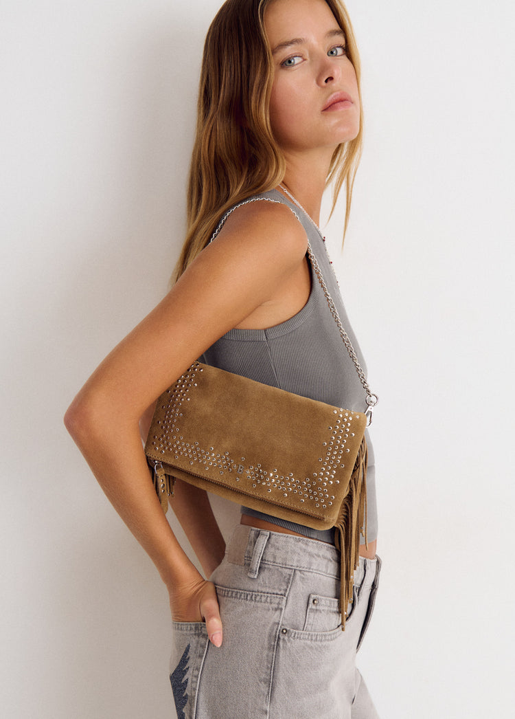 Leather flap bag with studs and fringes