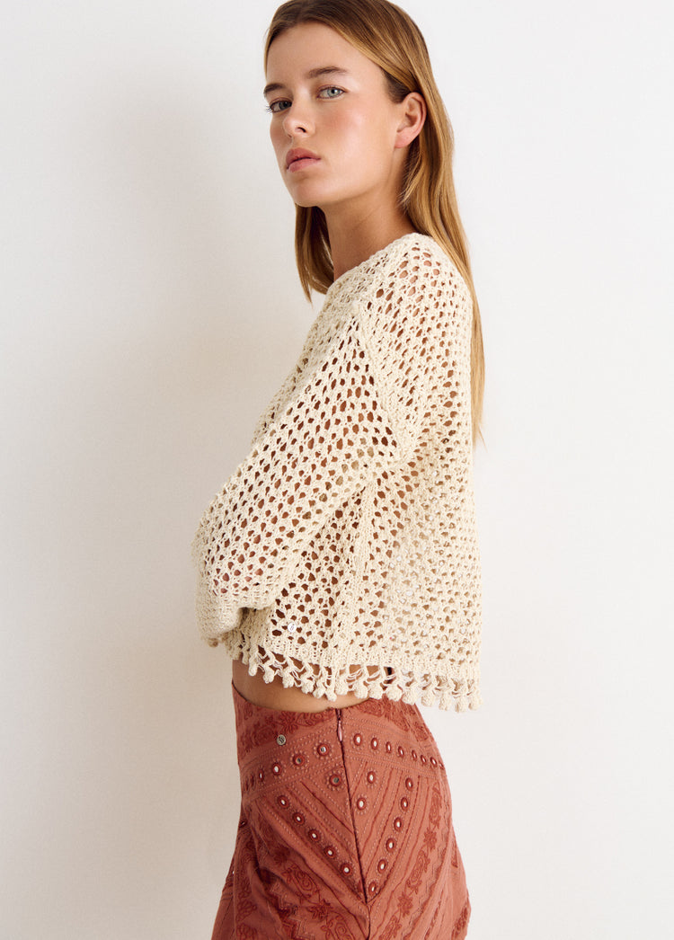 Open-knit red sweater
