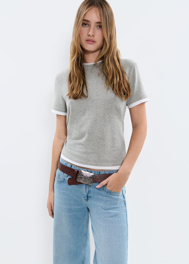 Belt with metal piece