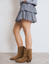 Botí cowboy de cuir amb serrells
