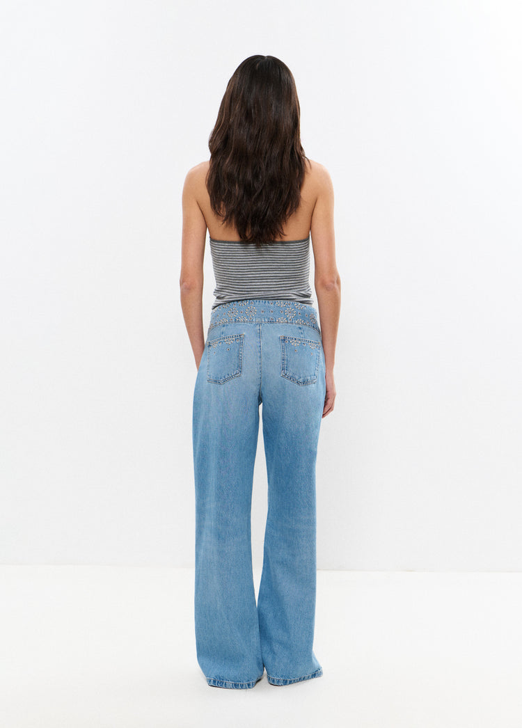 Jeans com cintura larga bordada