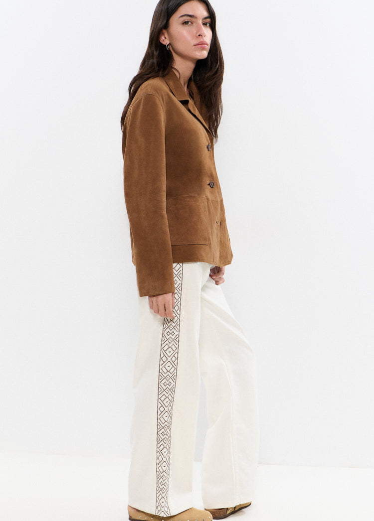 Broek met borduursels aan de zijkant