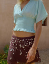 Embroidered smocked blouse