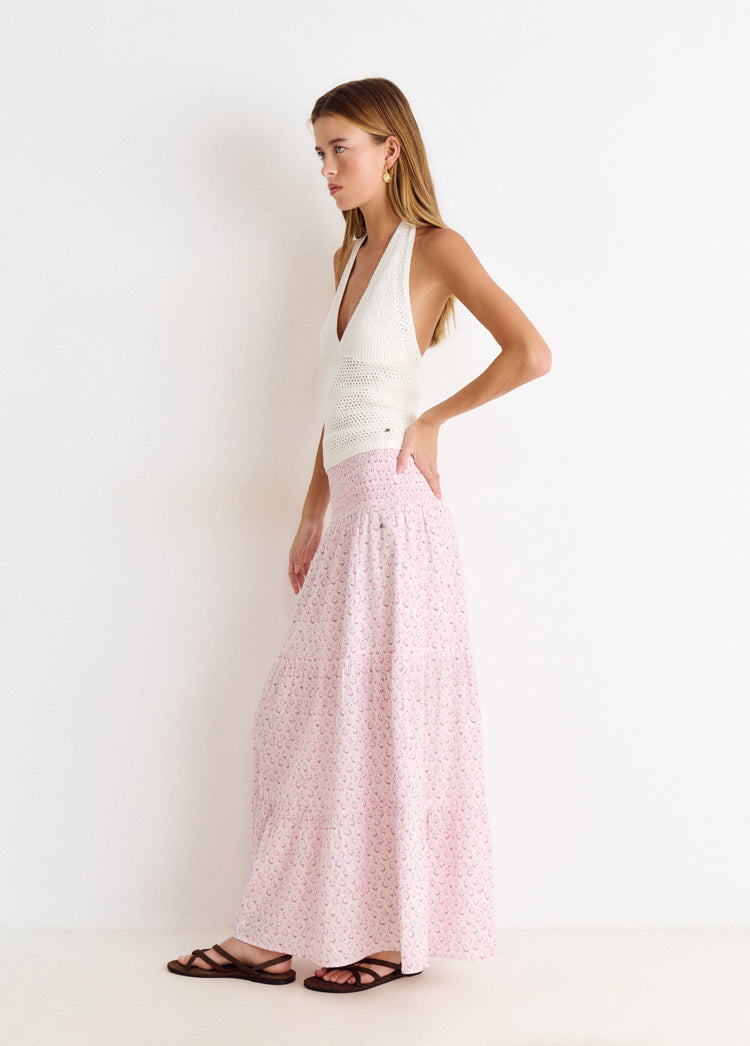 Falda larga rosa con estampado floral vista de perfil