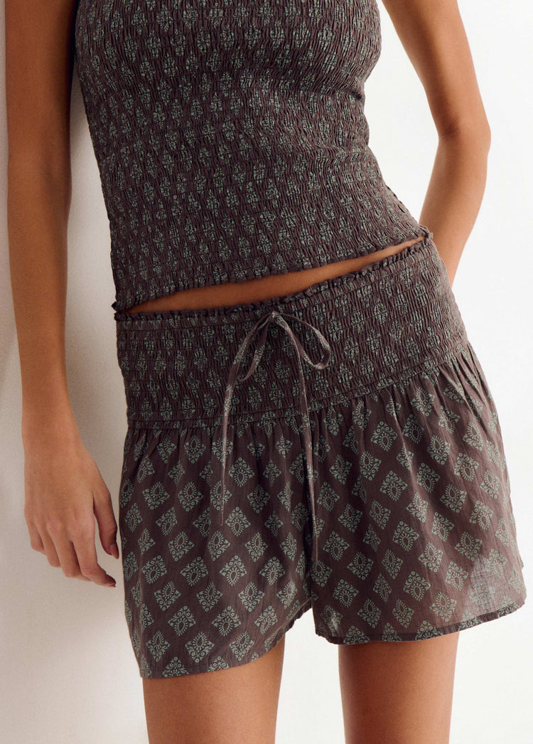 Short met smock en Indiaas motief