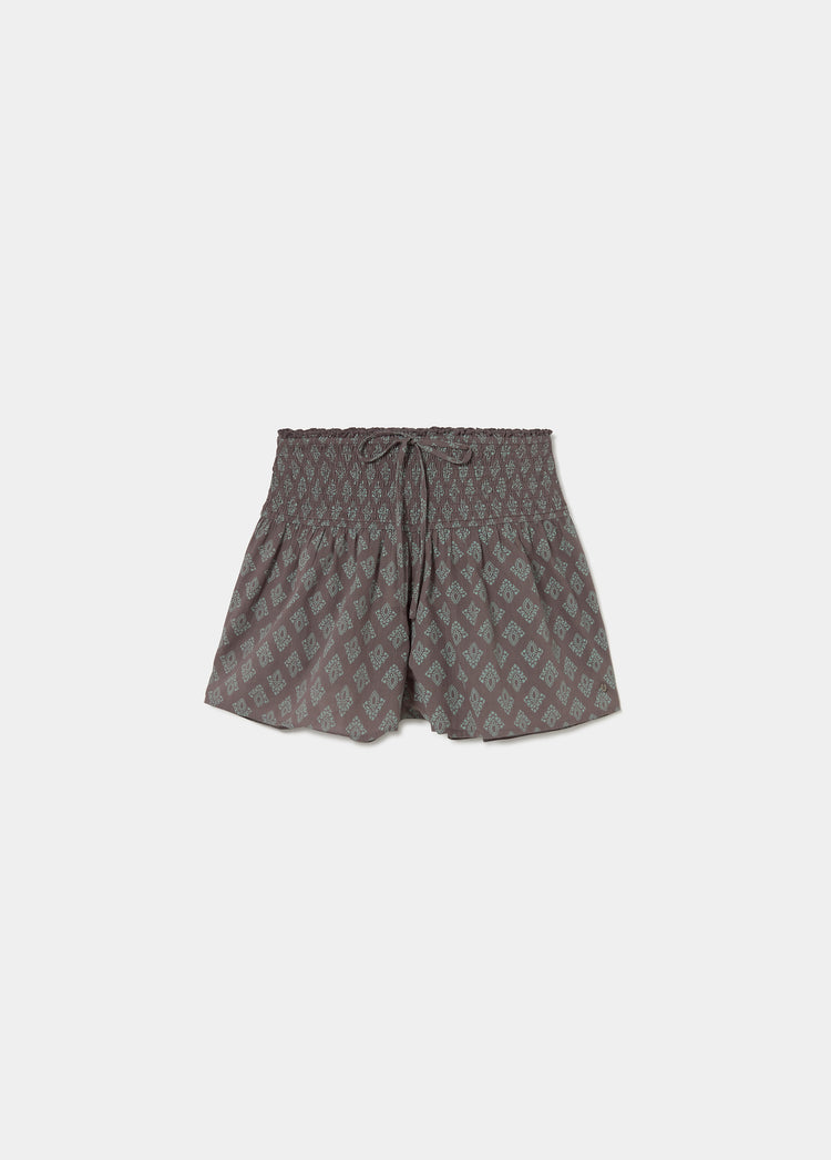 Short met smock en Indiaas motief
