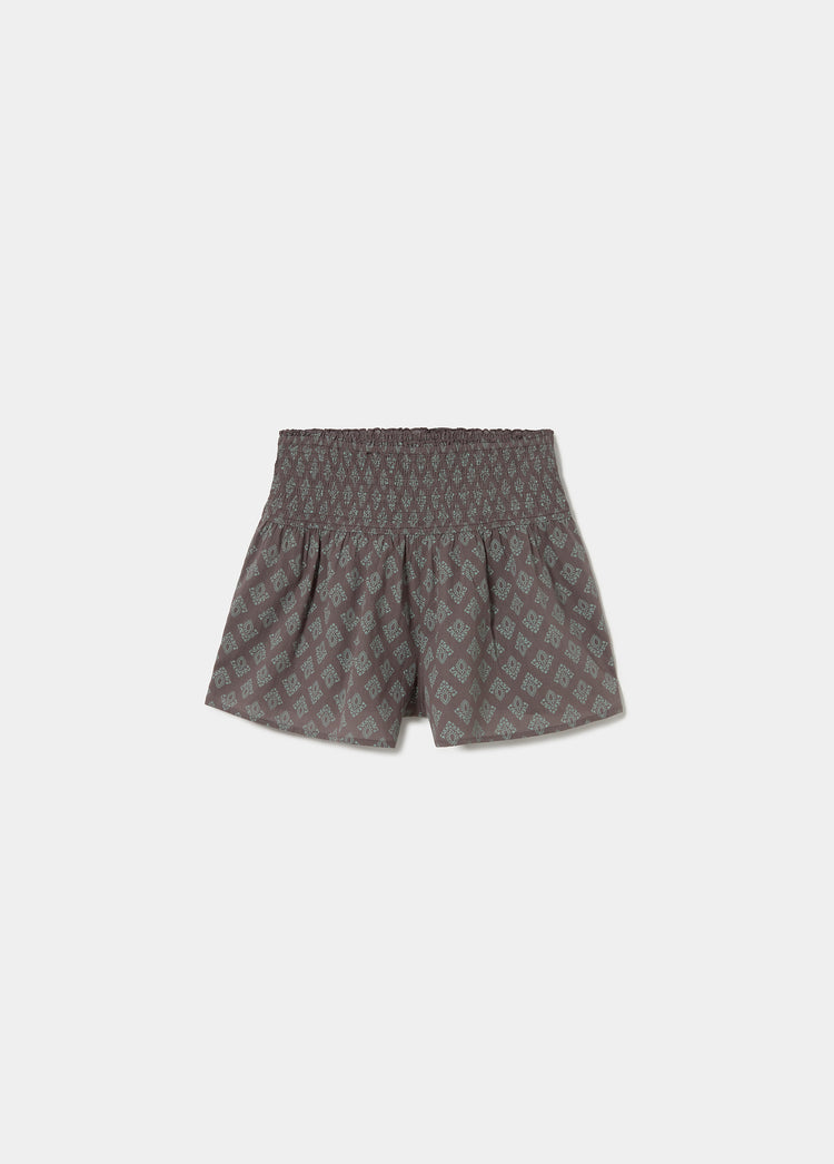 Short met smock en Indiaas motief