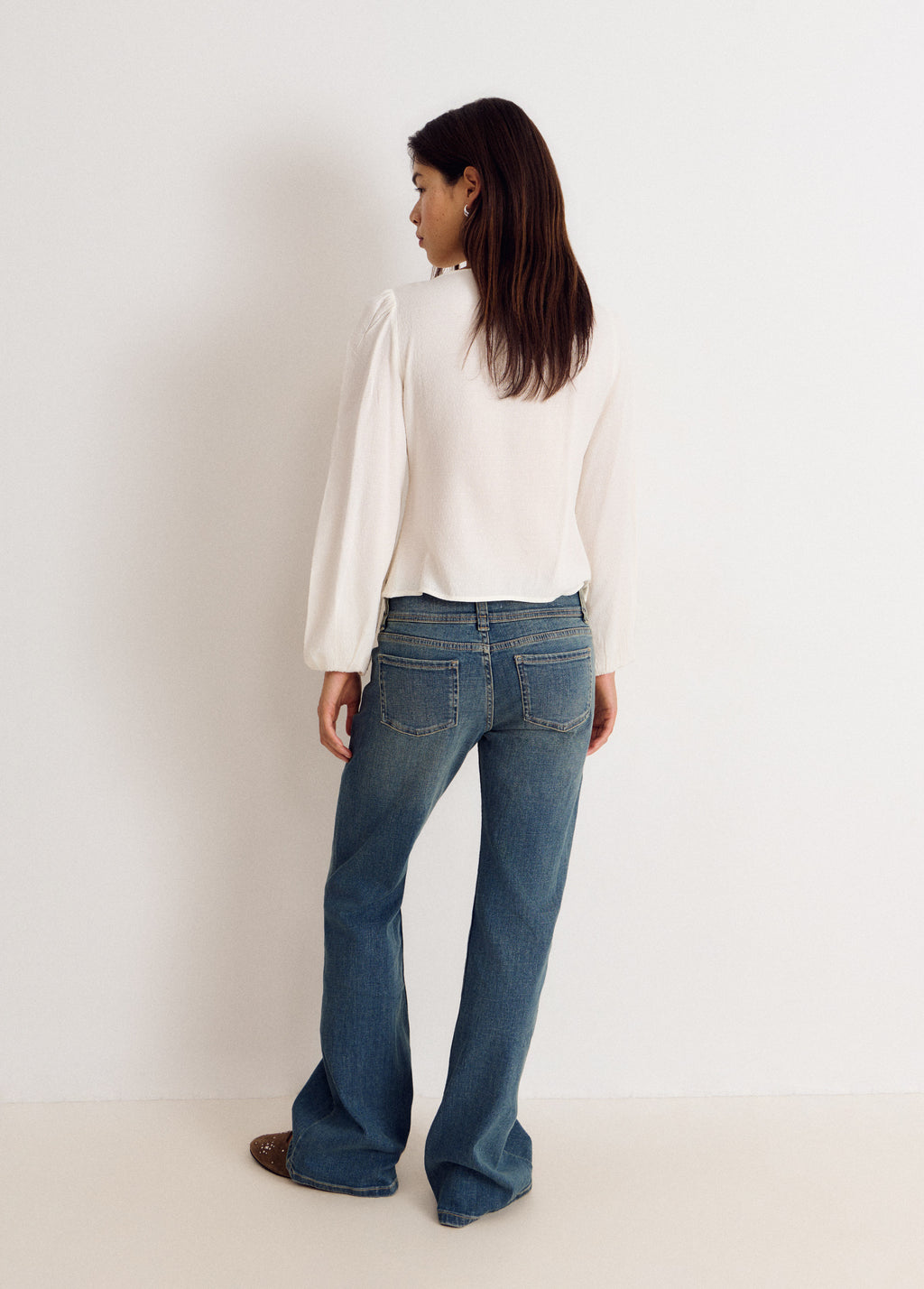 Long-sleeve smocked blouse