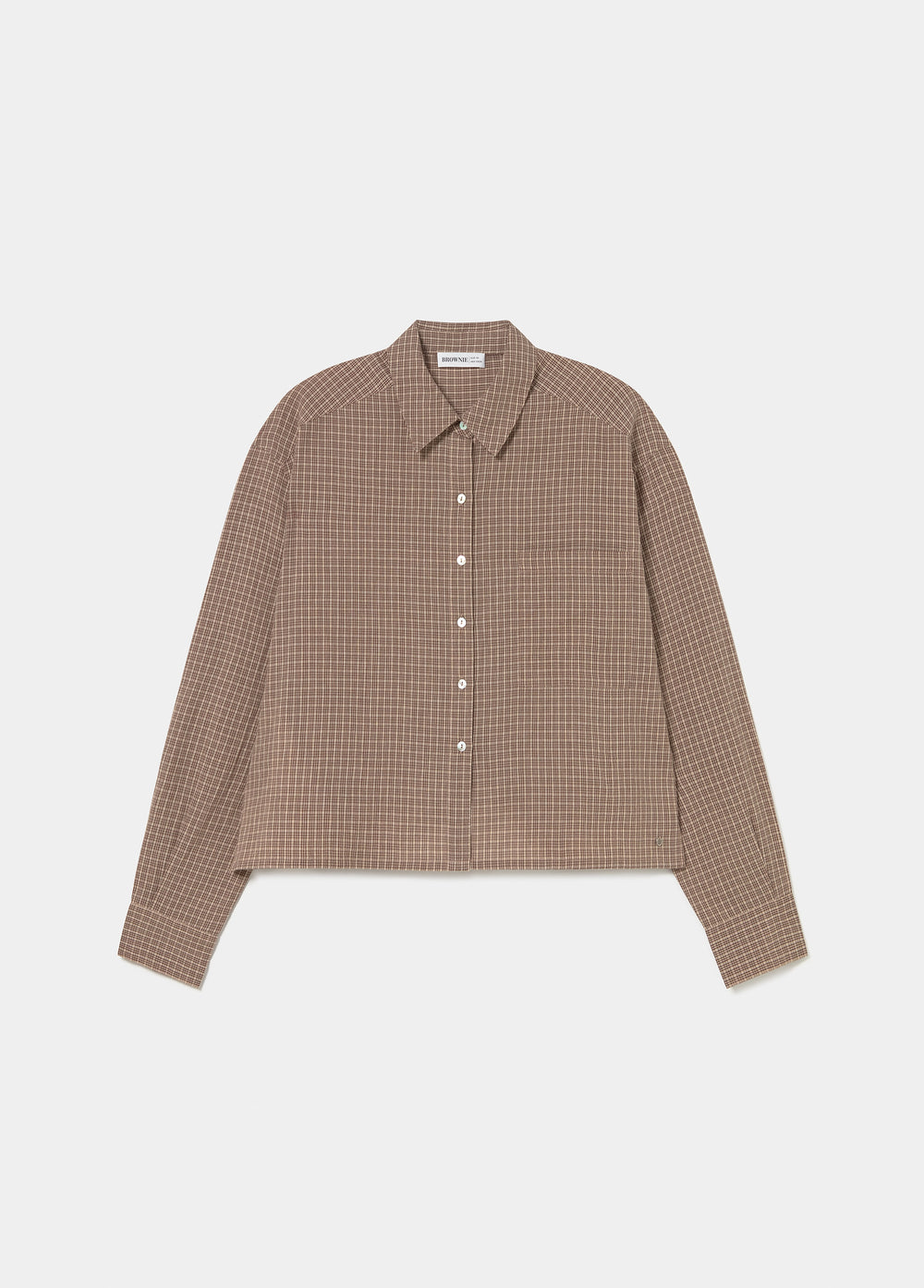 Blusa cropped de cuadros en tono crudo vista de frente