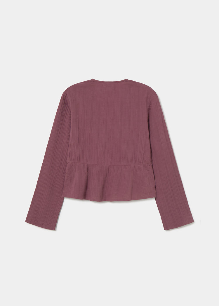 Blusa a maniche lunghe con borchie
