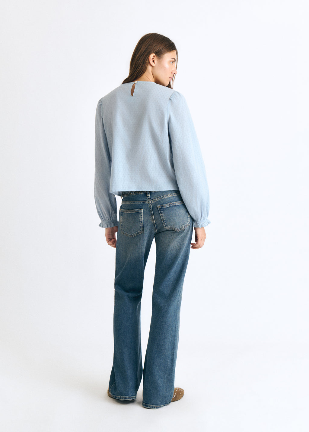 Blouse with lace and a high neckline