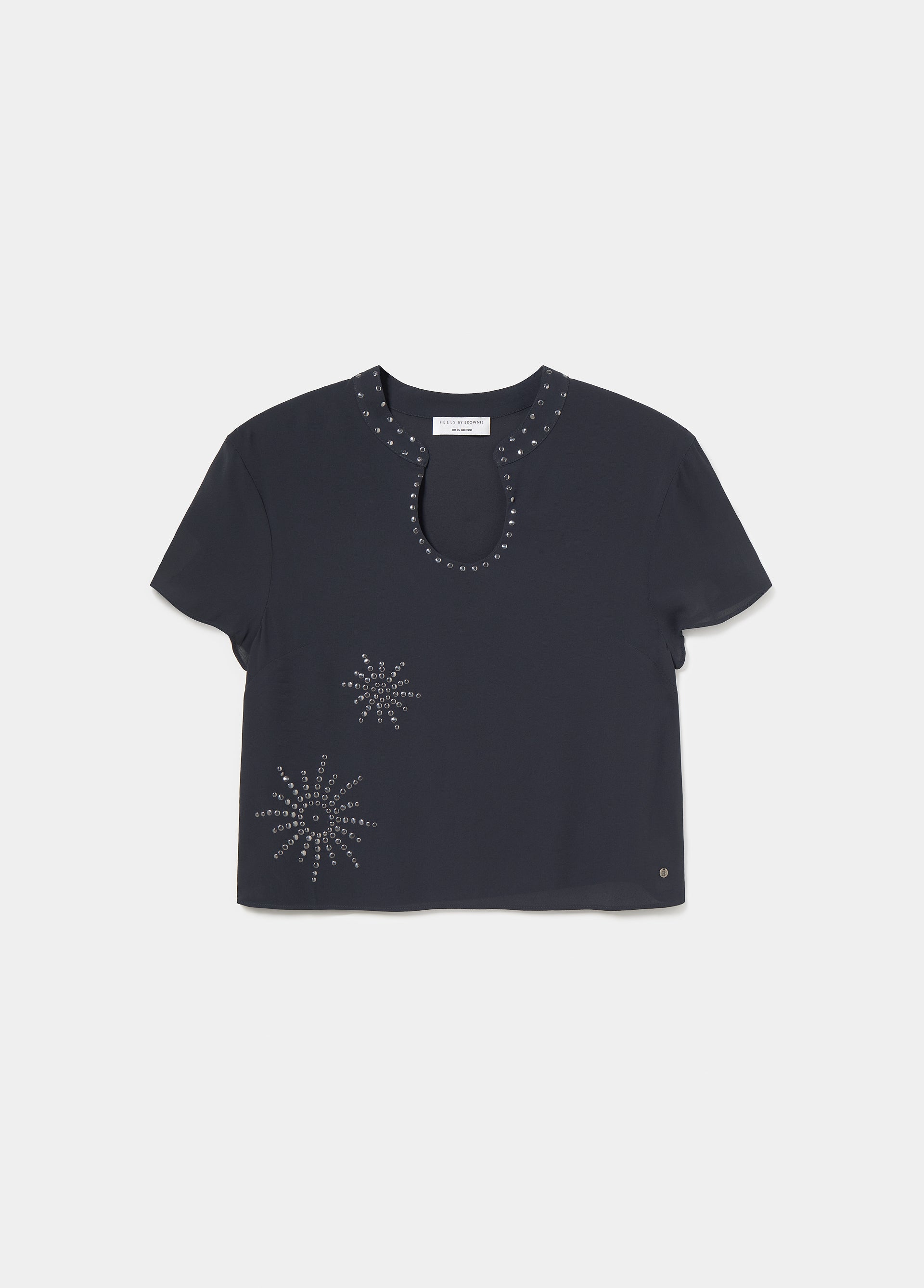 Blusa manga corta detalle tachas
