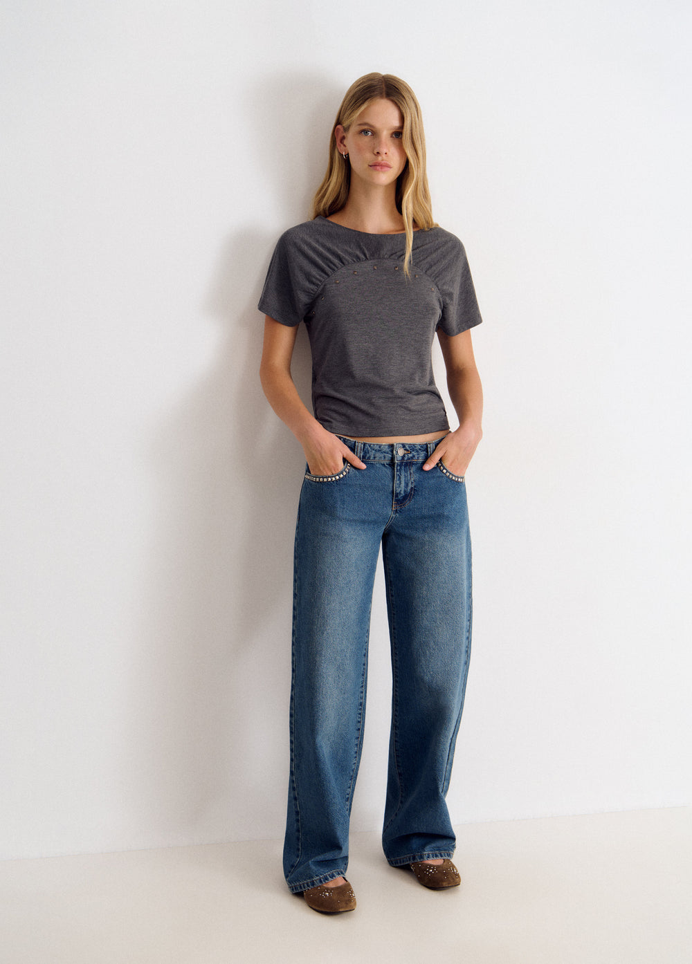Cross-studded jeans