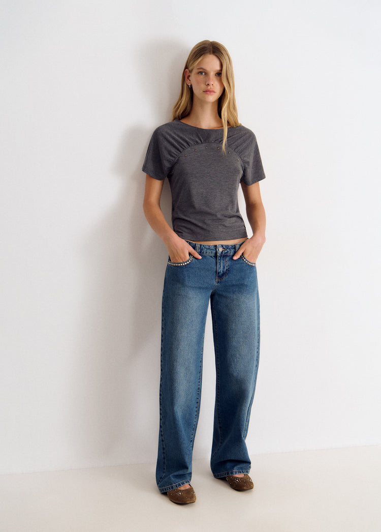 Cross-studded jeans