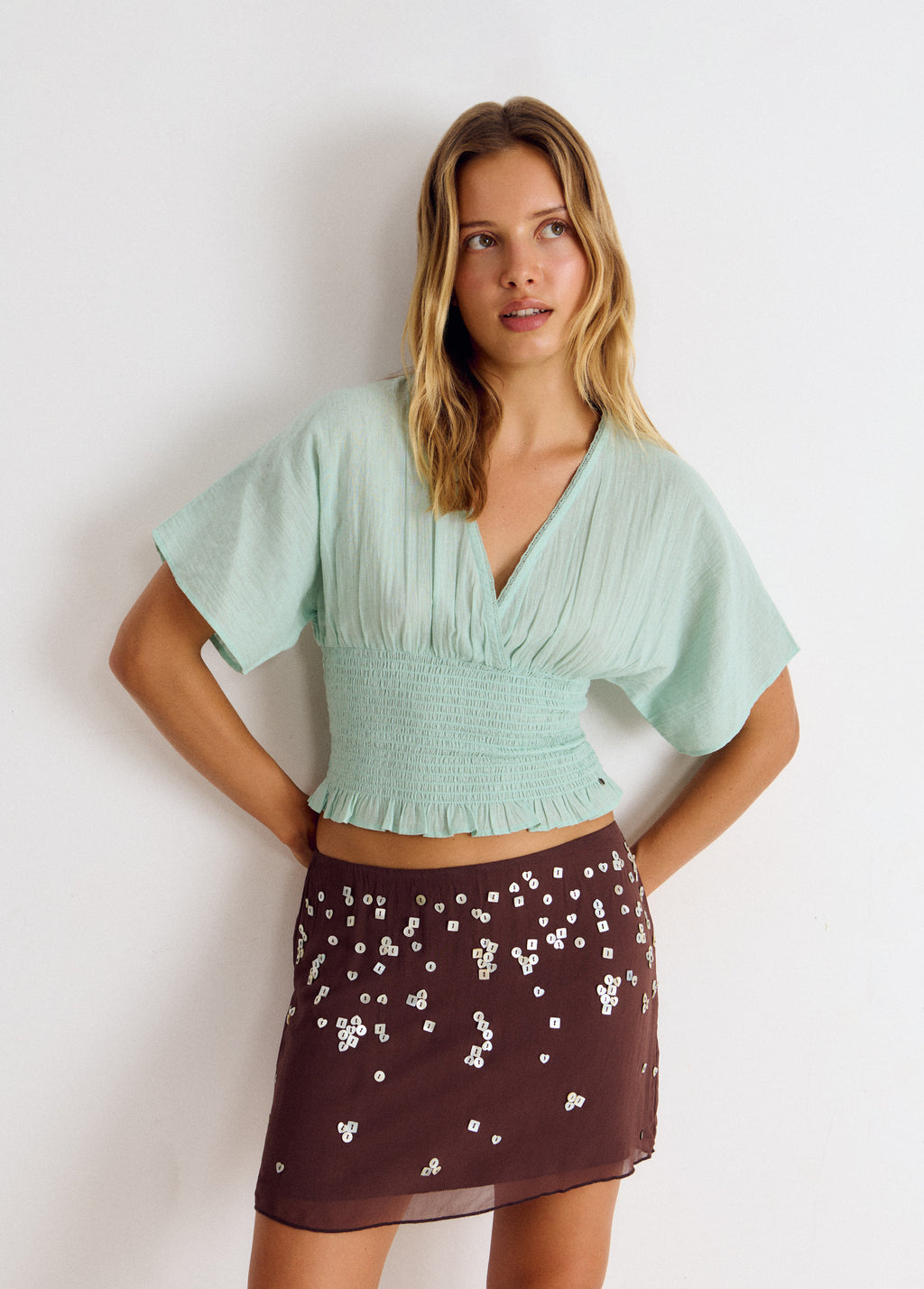 Embroidered smocked blouse