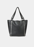 Bolso shopper negro de piel con tachas metálicas en los bordes y el asa