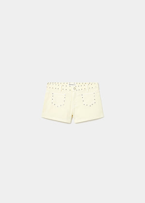 Short tachas decorativas