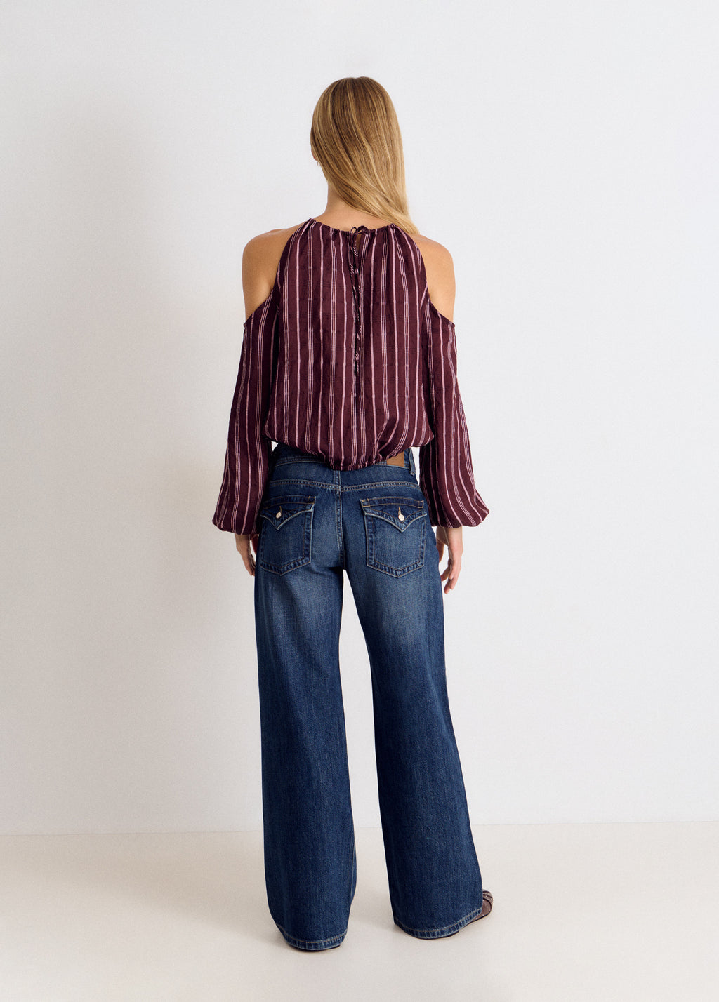 Blusa manga larga cut out rayas