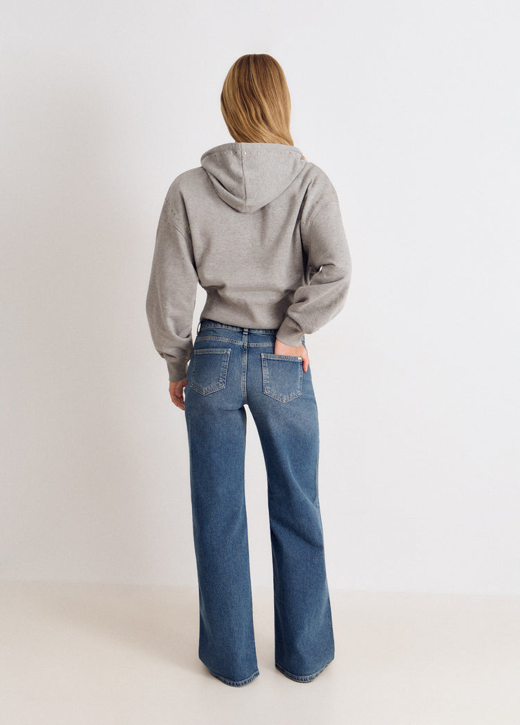 Embroidered front-pocket jeans