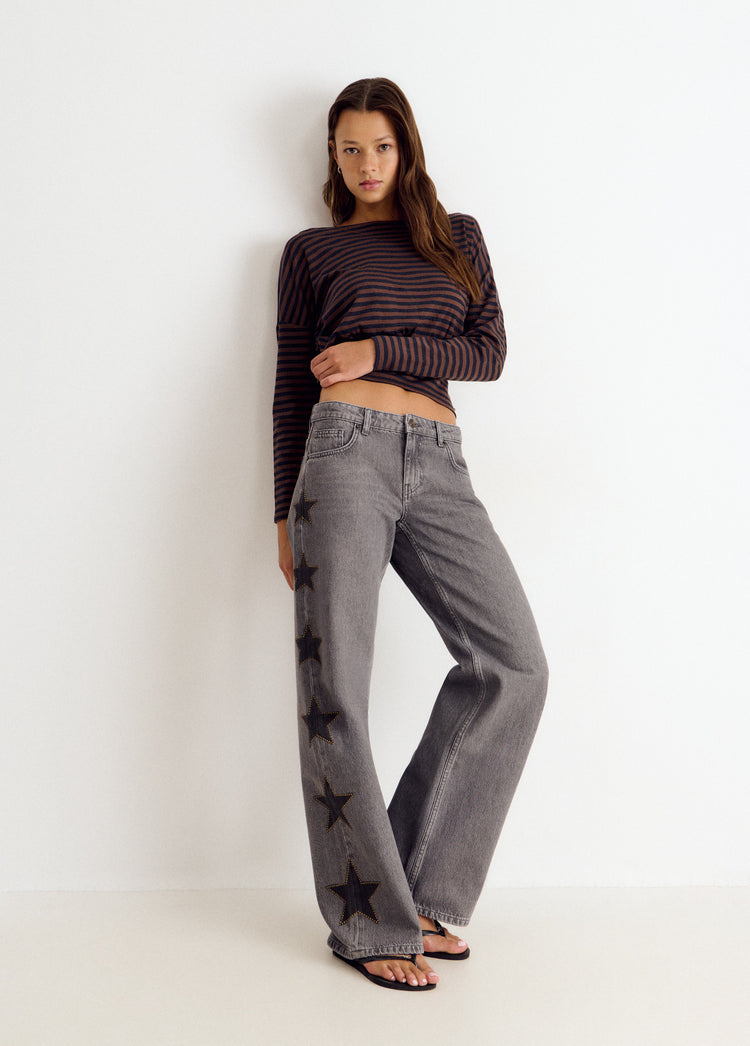 Jeans with stars and side studs