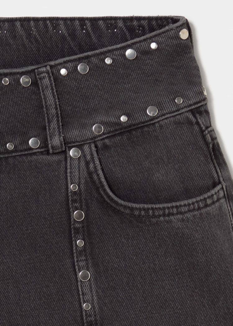 Jeans a zampa con borchie