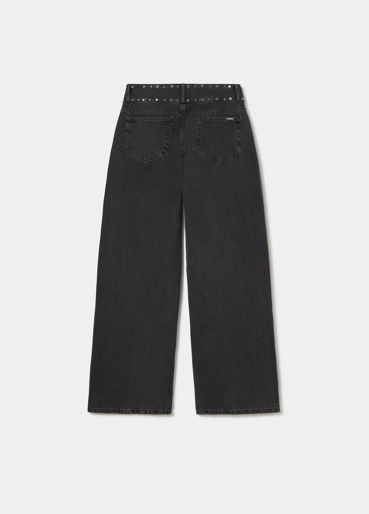 Jeans a zampa con borchie