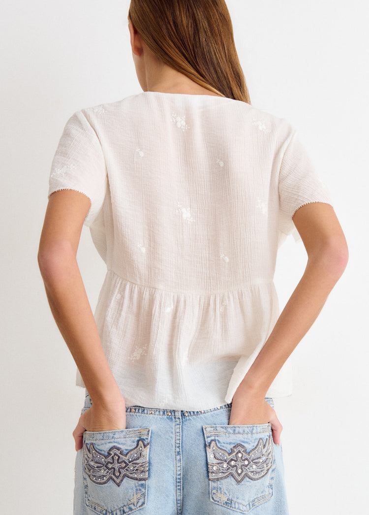 Blusa manga corta volantes