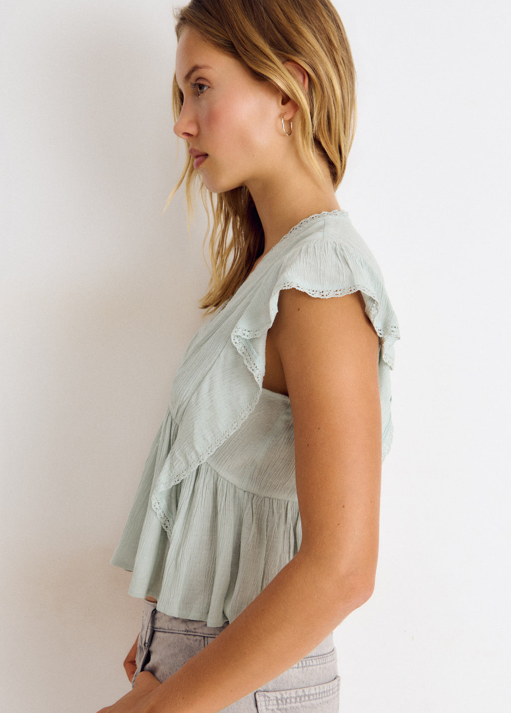 Romantic blouse with ruffles and lace trim