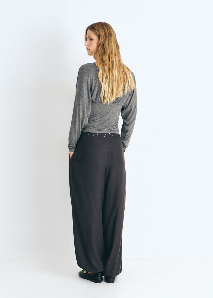 Pantalons bombat amb cintura de tatxes