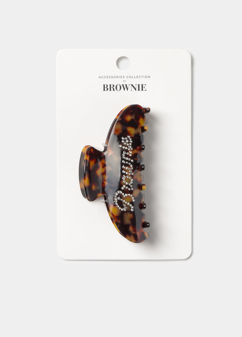Pinza pelo strass brownie de color carey medio sujeta el cabello en un recogido lateral
