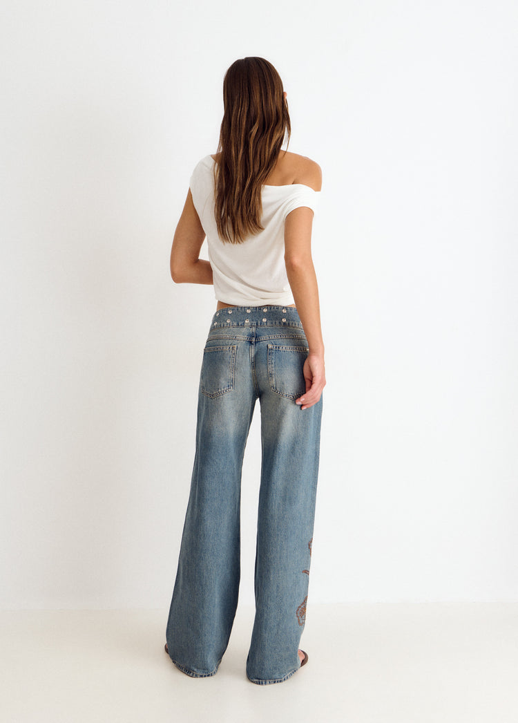 Studded embroidered waistband jeans