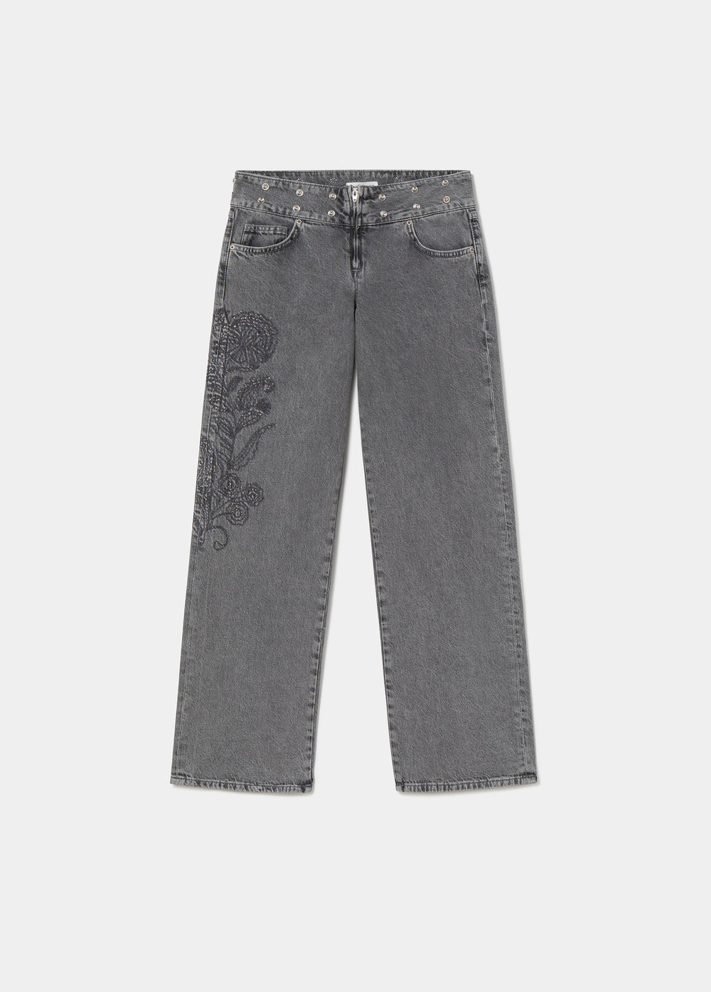 Vaqueros de gris medio con cinturilla tachas y bordado floral en la pierna