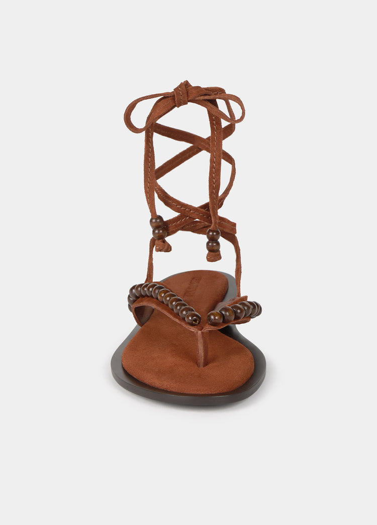 Flat sandals with wooden beads