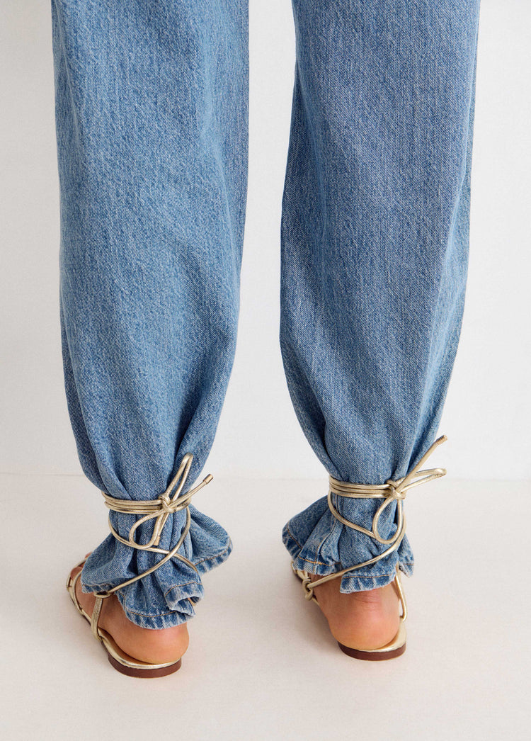 Flat sandals with tied straps