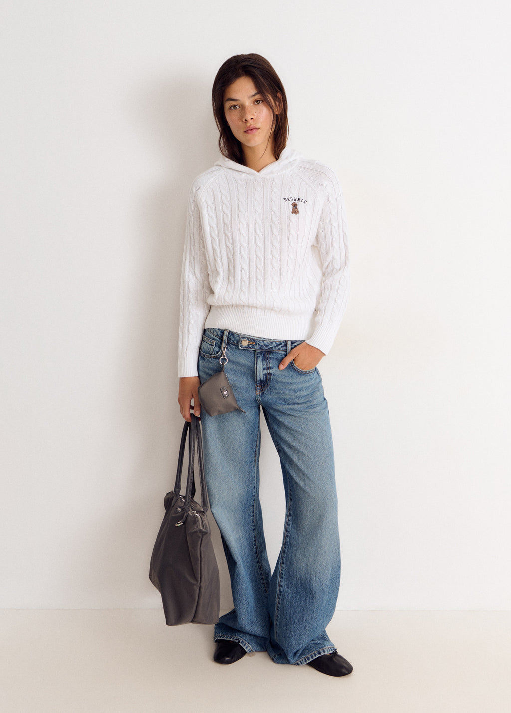 Pull en maille torsadée brodé