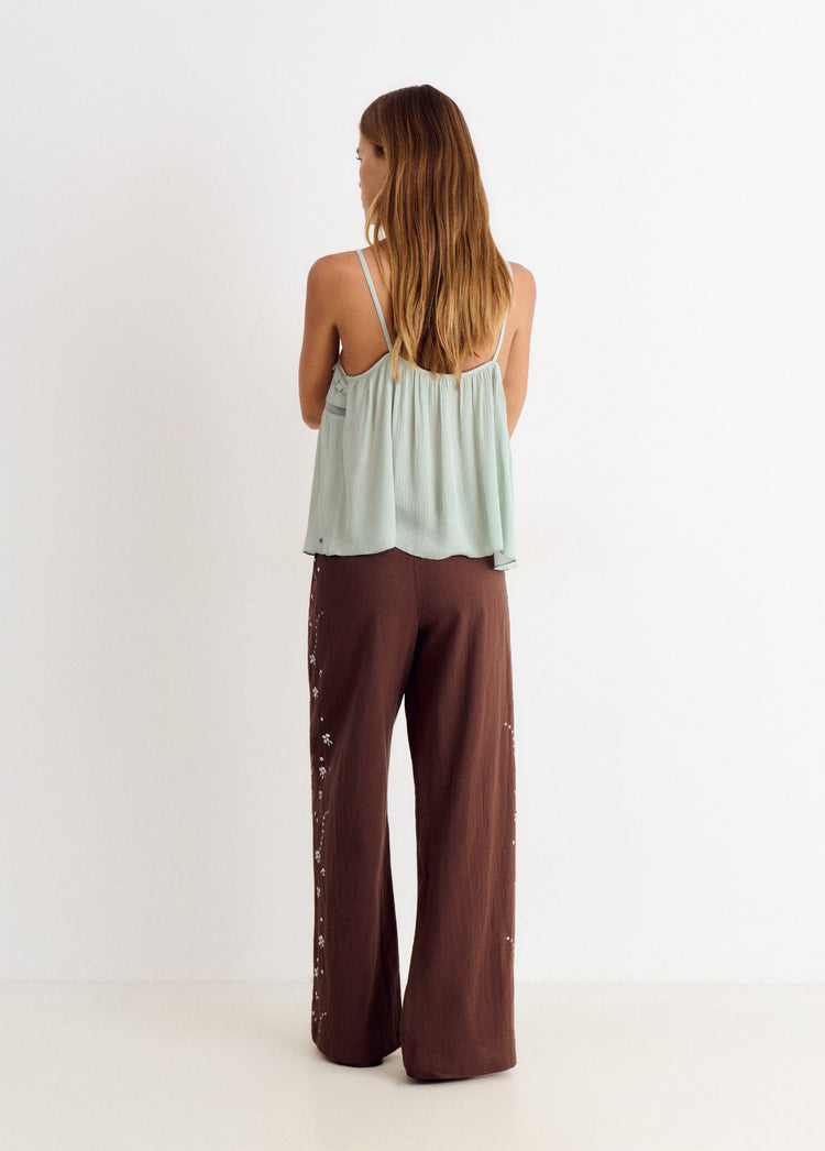 Pantaló fluid amb detall de lluentons lateral