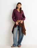 Long-sleeved ruffle blouse